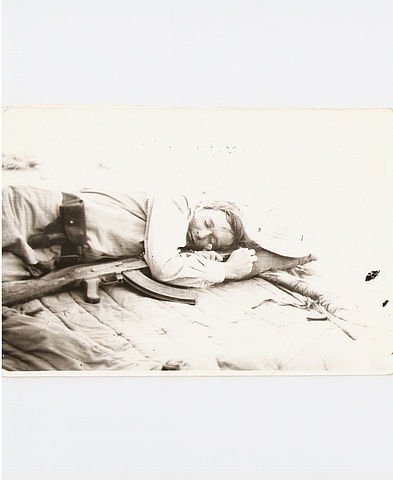 Soviet officer with pistol and AKM sleeping on operation 