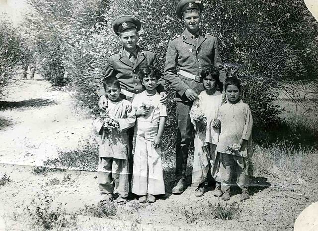 Soviet soldiers with Afghanistan kids