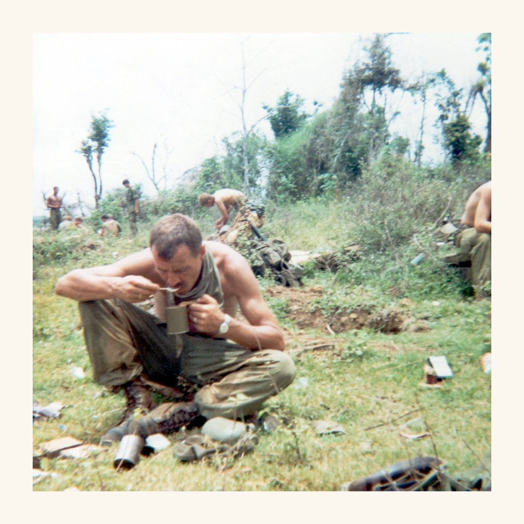 American soldiers in Vietnam earing in the field