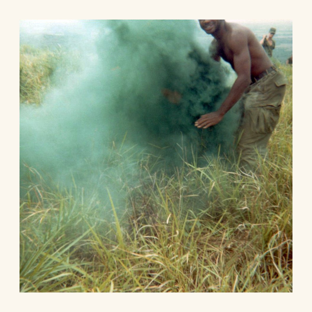 American soldiers in Vietnam with green smoke 