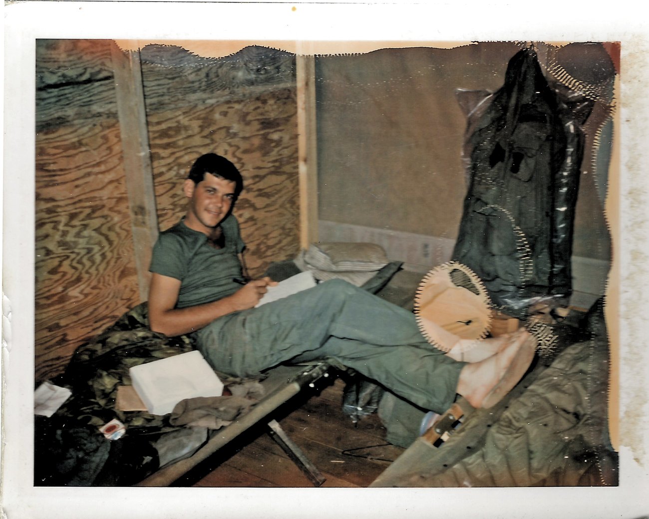 US Soldier in Vietnam reading a book 