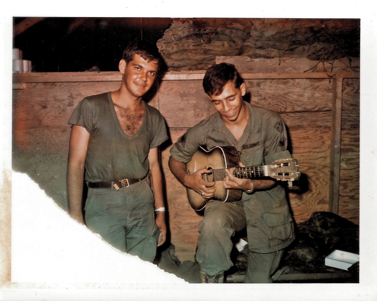 US soldiers in Vietnam playing guitar