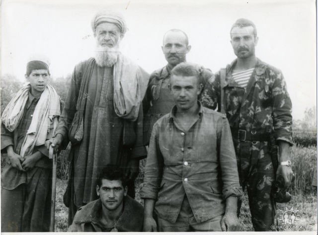 Soviets posing with local Afghanis 