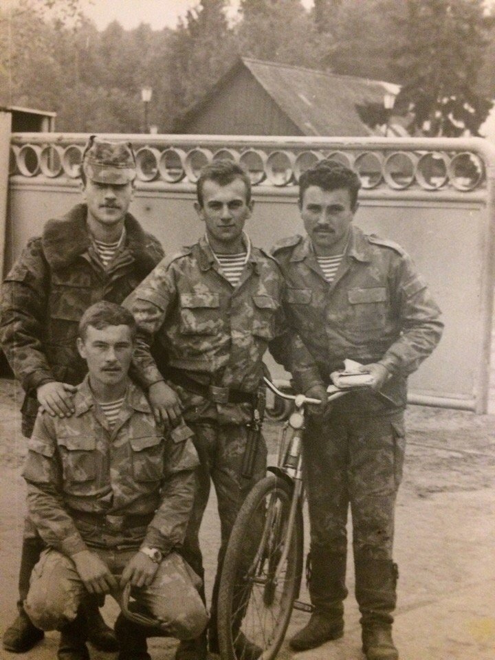 Paras in PV camouflage and a bicycle 