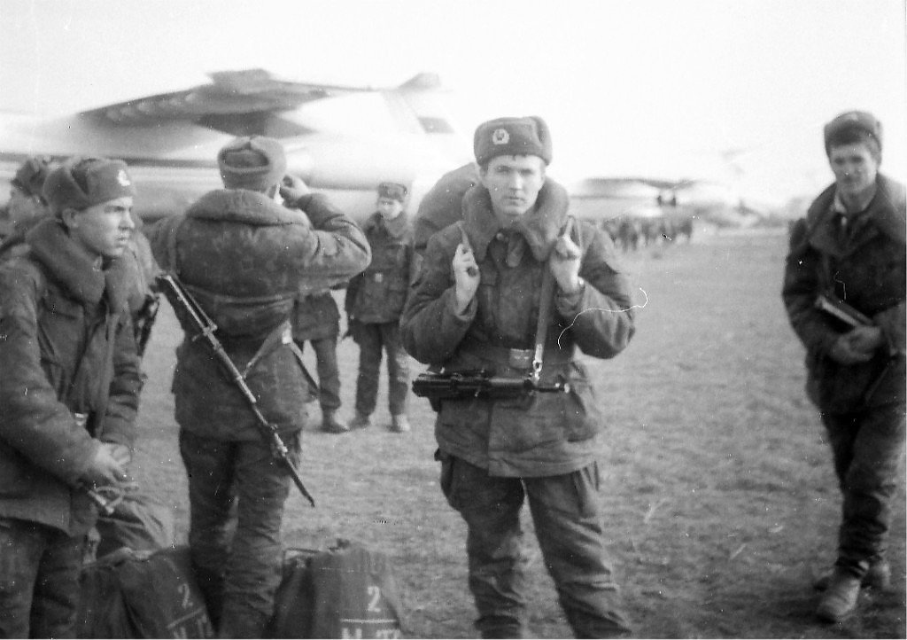 Winter gear in front of planes 