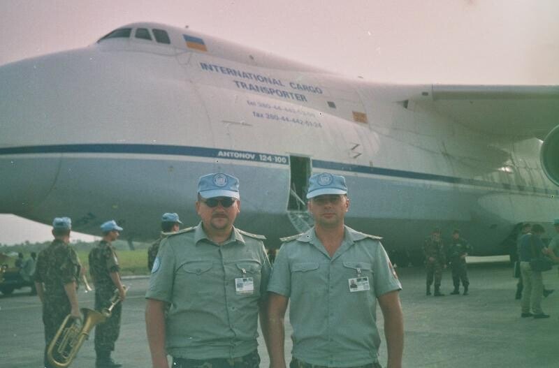 Ukrainian peacekeeper in front of An-225