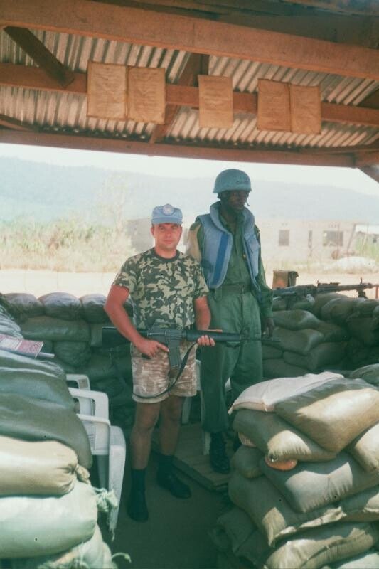 Ukrainian peacekeeper with collegue in blue body armour 