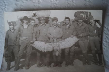 Soviet officers in Afghanistan with a hunted bird 
