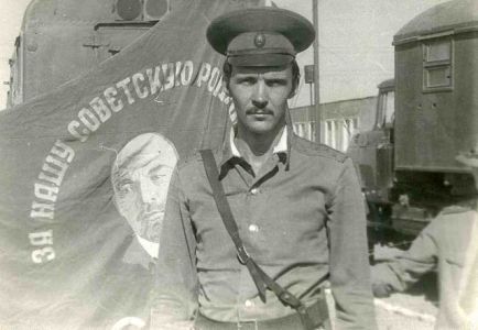 Soviet officer with regimental colours 