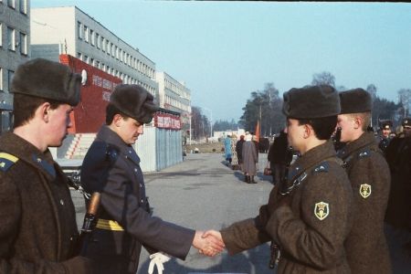 Coloured photograph of soviet paratroopers in greycoats 