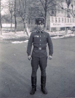 Soviet soldier in half wool uniform 